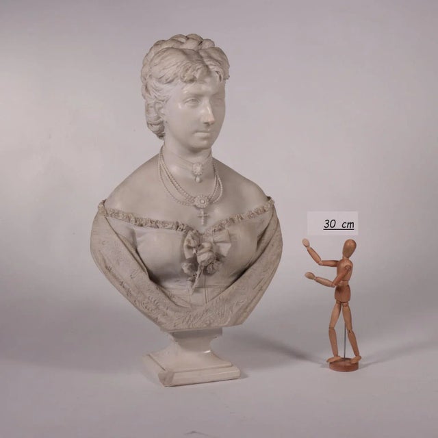 The bust portrays a noble woman, richly dressed. Certainly a portrait, as can be seen from the detailed physiognomic...