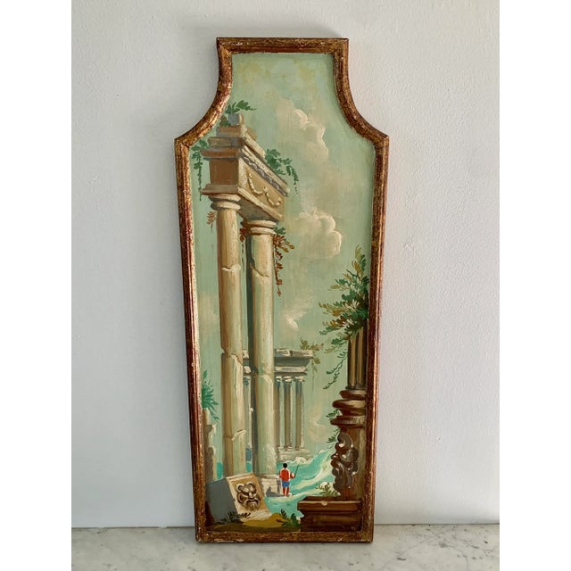 A gorgeous pair of Grand Tour or Neoclassical style framed oil paintings of an Italian Capriccio landscape with ruins...