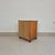 A charming small cabinet crafted in the style of late Art Deco, featuring elegant proportions and a beautiful combination...