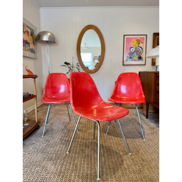 Original molded fiberglass shell chair, designed by Charles and Ray Eames for Herman Miller, dated 1970 on the bottom....