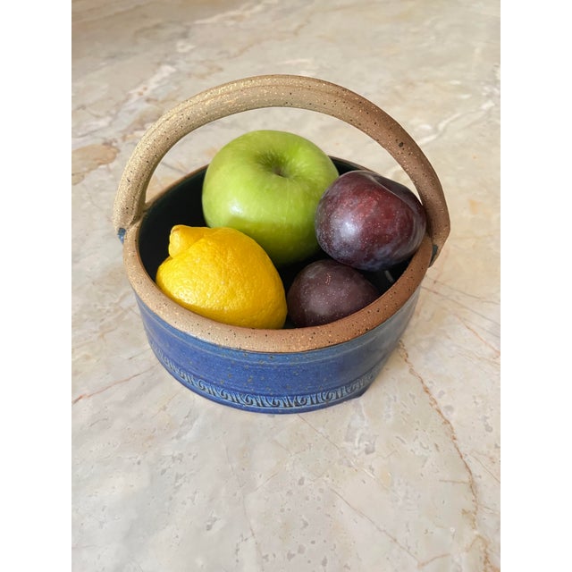 Beautifully executed ceramic serving bowl with cobalt blue glaze. The asymmetrical shape is quite a nice touch. Use it for...