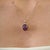 The Vintage Mid-Century 12.53 Ct Natural Oval Star Ruby Solitaire Pendant features an impressive 12.53-carat natural Star...