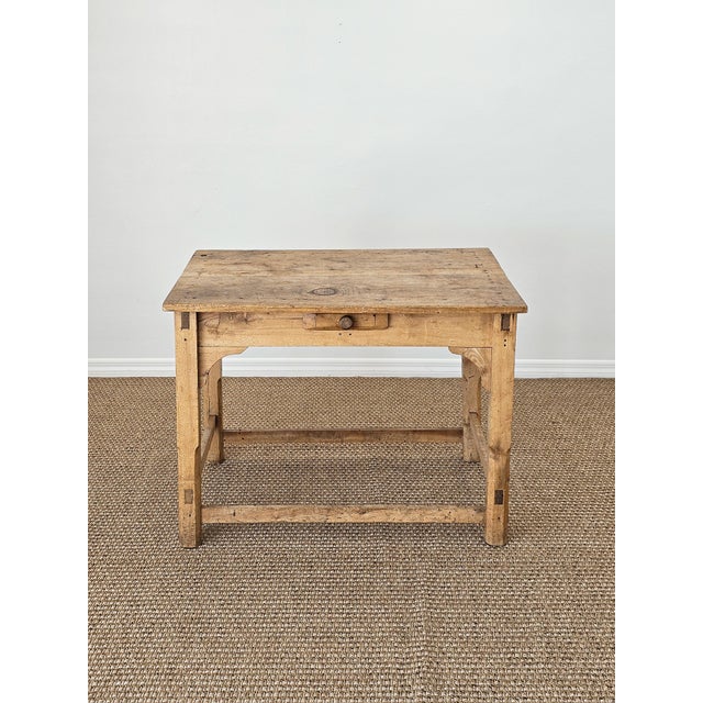 Dimensions: 39.5"W x 27.5"D x 29"H&nbsp; Floor to skirt 23.5"H&nbsp; &nbsp;A beautifully timeworn antique pine table, rich...