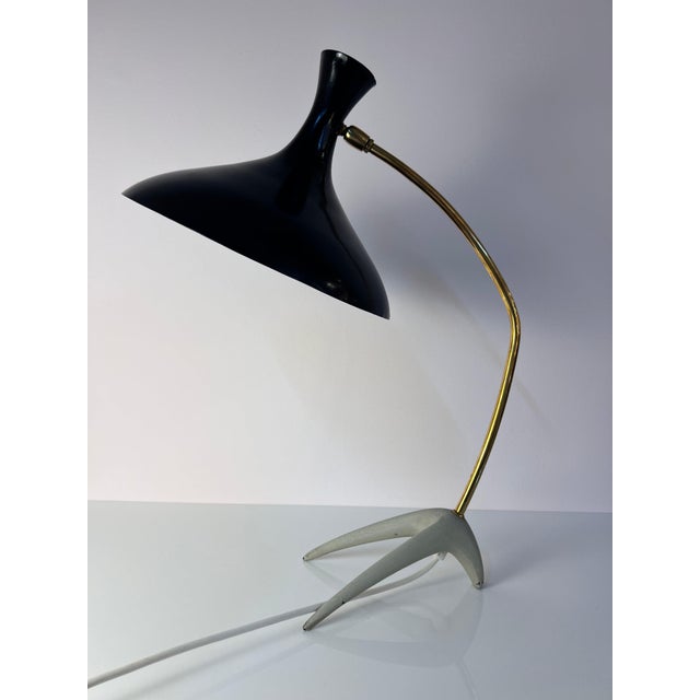 This exceptional table lamp is an iconic design classic from the 1950s, designed by karl heinz kinsky for cosack leuchten....