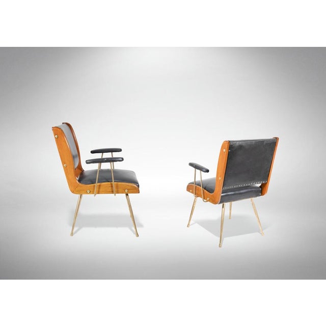 Pair of armchairs realized is an italian production, designed by Carlo Ratti in 1960s. Measures: Maximum backrest height...