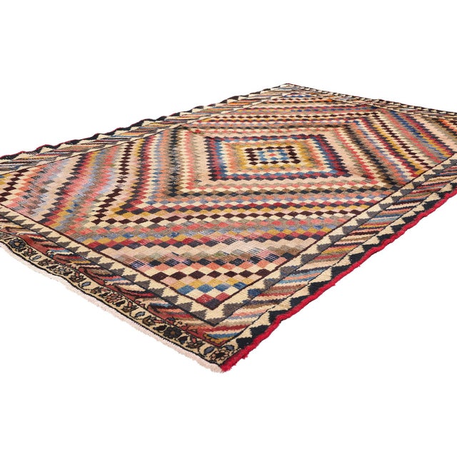 78867 Distressed Vintage Persian Lori Rug, 05'01 x 07'03. Immerse yourself in the captivating allure of this hand-knotted...