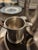 An elegant vintage 4-piece English Pewter coffee service ensemble by Leonard, handcrafted in Sheffield, England, circa...