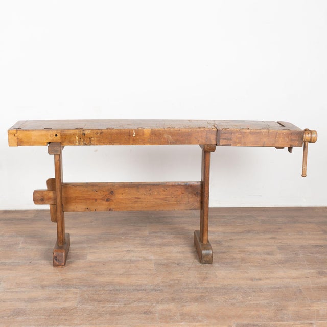 The worn patina of this old carpenter's workbench is a reflection of its age and years of use. Every ding, scratch, gouge,...