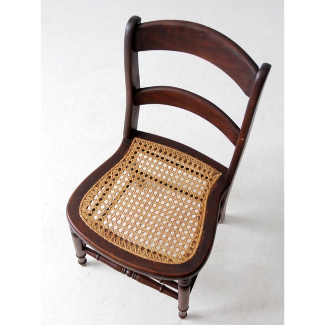 Wood Antique American Cane Seat Ladder Back Chair For Sale - Image 7 of 14
