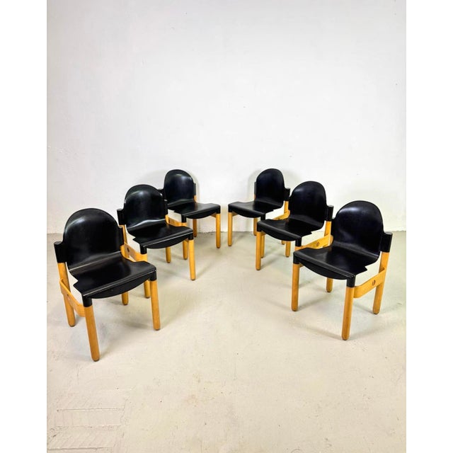Six of six Thonet Flex chairs, designed by Gerd Lange in the 1970s and produced by Kartell. Wooden frame, plastic seat and...