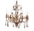 Italian Two Tiered Carved Giltwood, Iron, and Beaded Crystal Chandelier. Chandelier features hand-carved giltwood and is...
