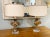 A pair of Antique fragments mounted on new lucite bases as lamps. With Shades Shades - 14” Wide 8.5” High Overall 8” Wide...