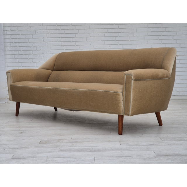 1960s, Danish design by Kurt Østervig for Rolschau Møbler. 3 seater sofa, model 57, in original very good condition: no...