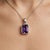 This elegant pendant features a captivating Amethyst gemstone, admired for its rich violet hue and timeless appeal. Known...