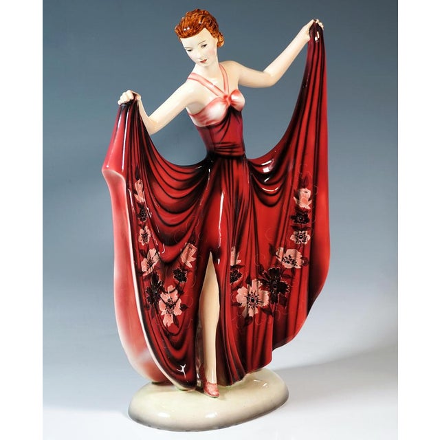 Delicate goldscheider art déco ceramic figurine of the 1930s: a dancer posing gracefully with her head tilted to the...