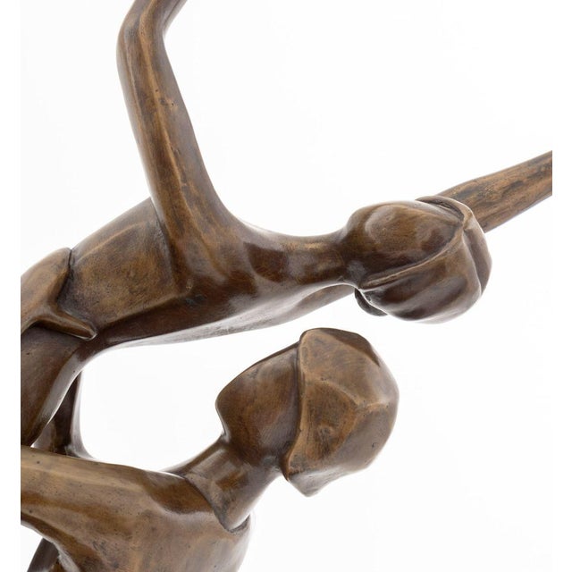 Tanya Poust (American, XX) Dancing Couple Patinated Bronze Sculpture, atop a black marble plinth with "Tanya Poust" plaque...