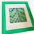 Meet Chloe—a vibrant, one-of-a-kind piece of upcycled wall art featuring Schumacher’s Florentine Velvet designer textile...