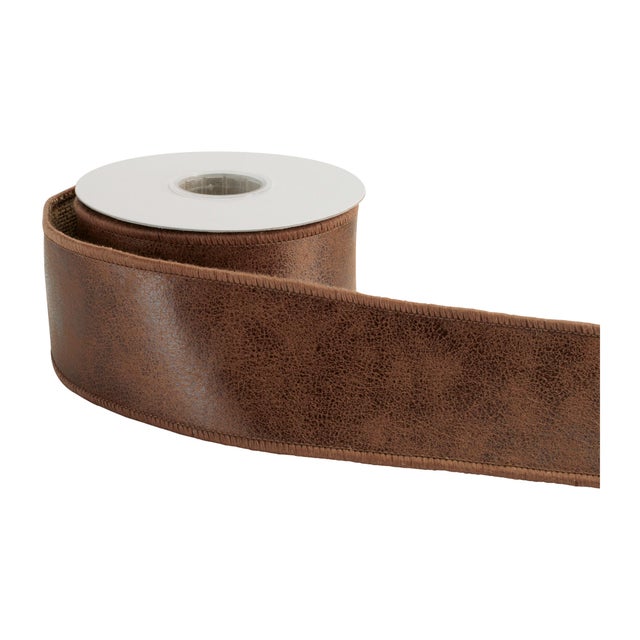Add rugged charm and rich texture to your décor with this distressed faux leather wired ribbon. Designed with a realistic,...