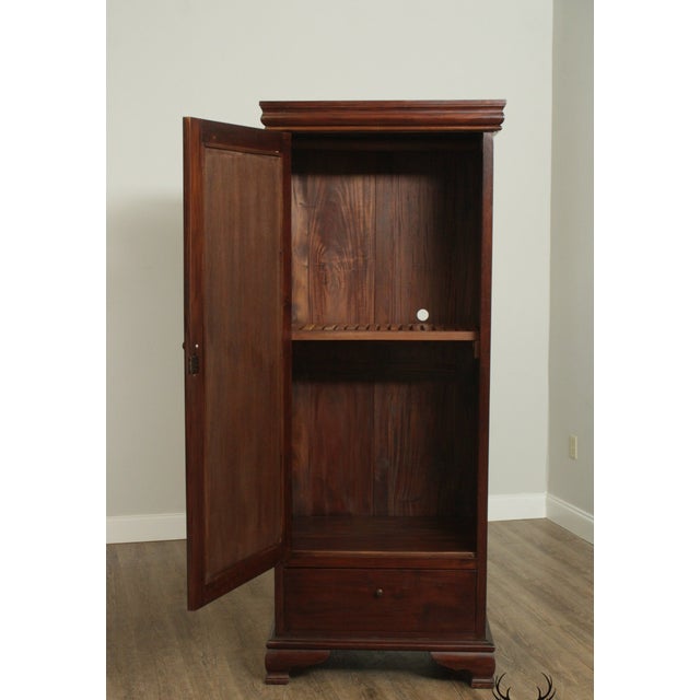 Beautiful Hard Wood Mirrored One Door Wardrobe Cabinet features an elegant edges with mirror door. Beautiful carved edges.