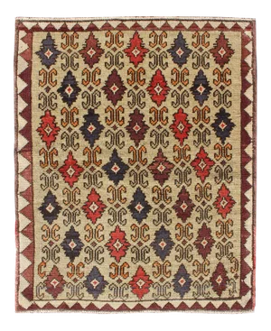 Colorful Midcentury Turkish Tulu Rug With Repeating Design Set on Wheat Field
