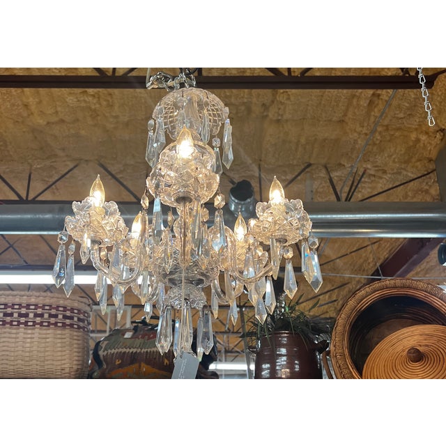 Beautiful 5 arm Waterford crystal chandelier purchased in Ireland in the mid 1900's. All original. No missing crystals, no...