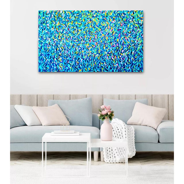 Evening reflection. Lago di Garda. Italy. This vibrant work of art explodes with an intricate interweaving of blue hues,...