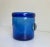 Stunning mid-century modern ice bucket or wine bottle chiller. It features a vibrant cobalt blue body with clear glass...
