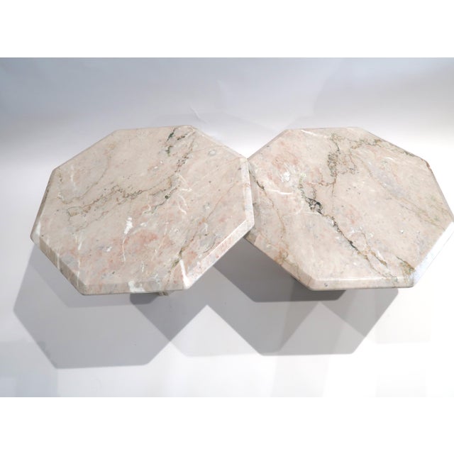 A pink and beige set of octagon-shaped coffee tables, one of which is taller. In almost perfect condition, this type of...