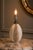 An exceptional and highly collectible art deco ceramic table lamp by the prestigious maker nildes. Characterized by a...