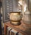 A Japanese Showa Period bronze pedestal planter with elephant handles and a wood base. Made in Japan between 1880 and...