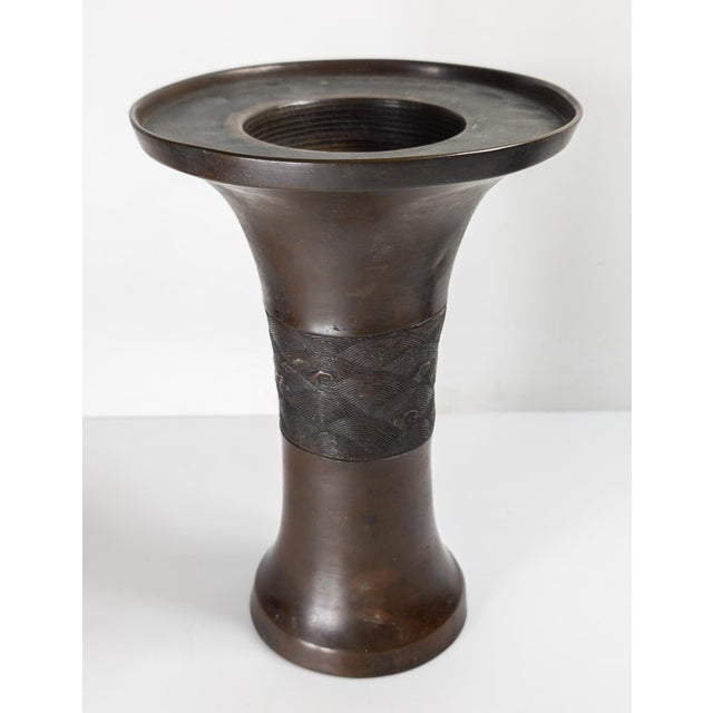 We are selling this pretty Japanese bronze Gu form vase. This vase has great form and was intended for use as a flower...
