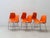 This stacking chair by helmut starke, with its vibrant orange seat shell, brings the characteristic charm of the 1970s to...