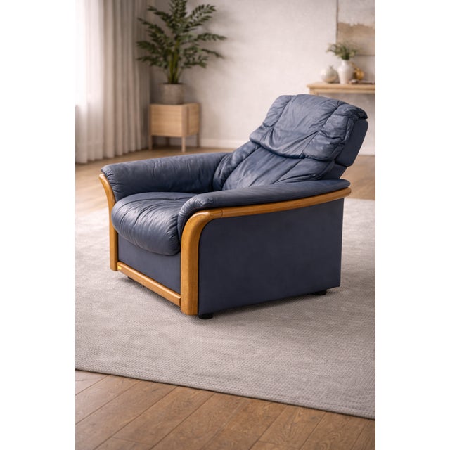 Adjustable Swivel Armchairs in Blue Leather and Beech from Ekornes Stressless, 1980s, Set of 4, in Good conditions....