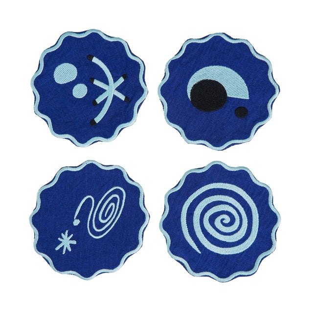 Our Celestial Collection coasters are embroidered with dreamy motifs inspired by fantastical surrealist art, and are...