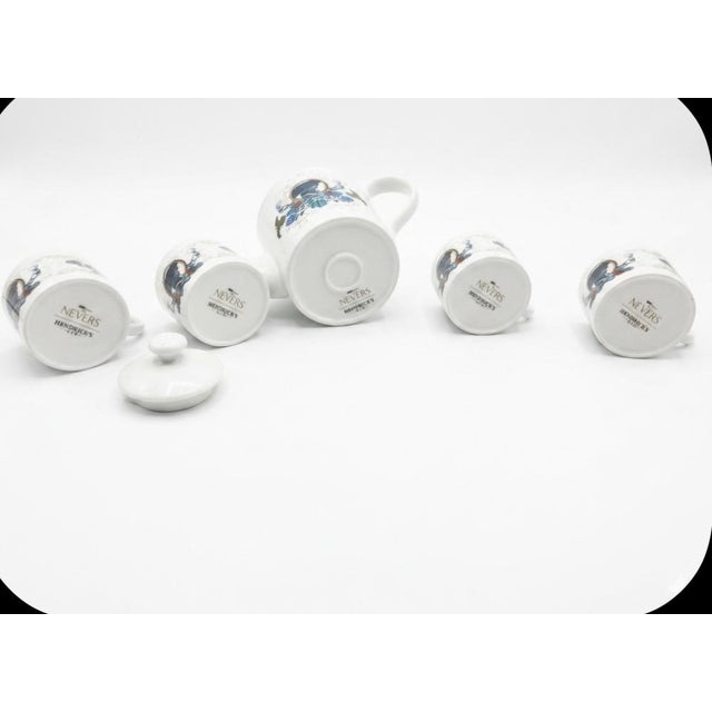 Step into a delightfully topsy-turvy world of refined eccentricity with this rare, highly coveted Hendrick's Gin porcelain...