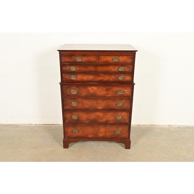 A gorgeous Georgian or Chippendale style seven-drawer highboy dresser or chest of drawers By Henredon USA, Circa 1950s...