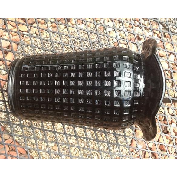 This exquisite ebony vase stands almost 6” tall. Made of black milk glass in the fabulous '50's, this vintage glassware is...