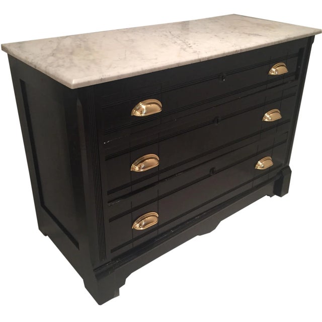 Antique black painted Victorian commode/ chest of drawers with marble top. The piece has been painted with semi gloss...