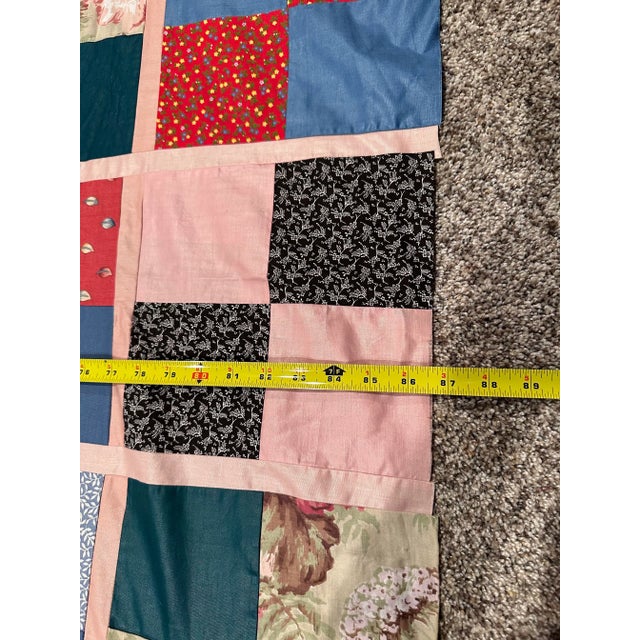 Vintage quilted top ready for the batting and backing to complete. Most of the hours have been put in! Blues and reds come...