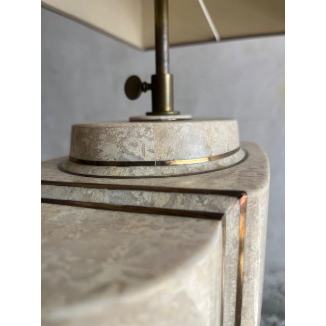 Set of 2 Vintage Design Architectural table lamp in travertine and brass style maison jansen, 1970s. This well sized and...