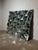 Spectacular large sculptural mirror composed of dozens of faceted mirrored panels arranged in a dynamic geometric...