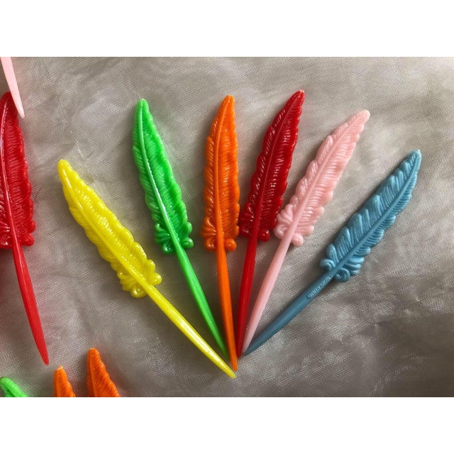 This set of colorful vintage picks will add a whimsical touch to your cocktail party bar. Shaped like pen quills, the...