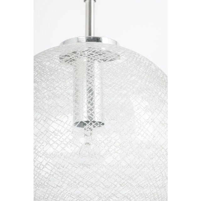 1 of 12 clear glass ball (hand-made) pendants, manufactured by limburg, germany, circa 1970-1979. Sockets: 1 x e27...