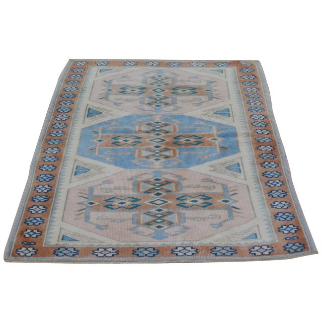 Hand-knotted with care using traditional rug-making techniques, this wool rug blends timeless craftsmanship with a modern...