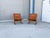 Designed by Ingmar Relling for Westnofa in 1960s Norway, this pair of iconic "Siesta" lounge chairs represents a...