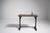 A distinctive bistro table inspired by Thonet’s bentwood techniques, characterized by elegant curved elements and...