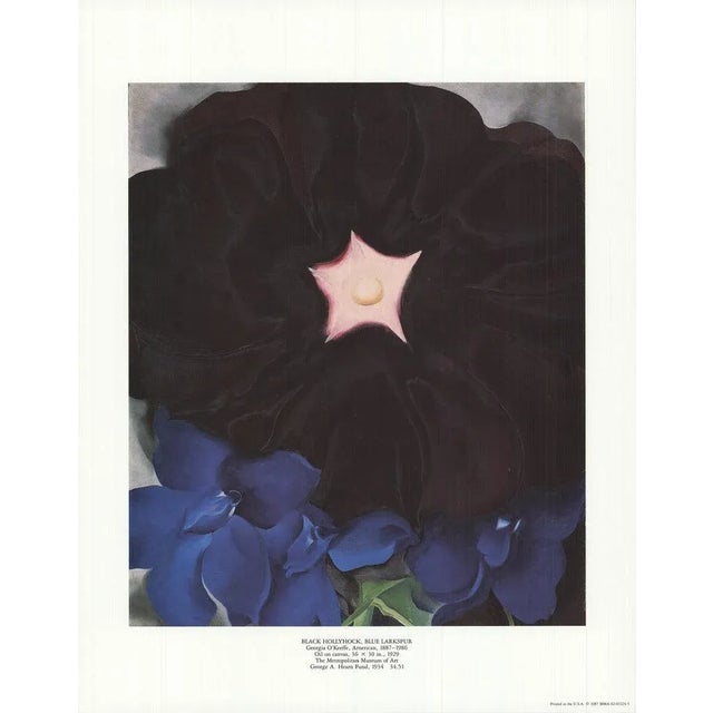 Artist: Georgia O'Keeffe Title: Black Hollyhock, Blue Larkspur Year: 1987 Signed: No Medium: Offset Lithograph Paper Size:...