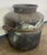 A striking antique copper storage vessel, hand-forged with a beautifully timeworn surface and rich verdigris patina. This...