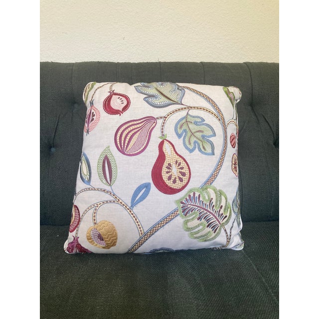 Four throw pillows in Jane Churchill embroidered linen with real down inserts. Subtle natural greens, deep reds and baby...