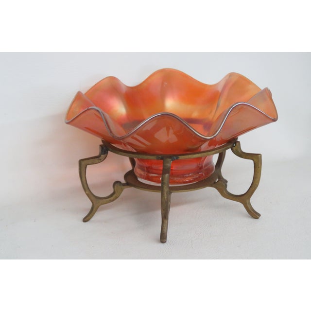 This beautiful Candy Dish / Bowl is made of glass. This lovely Bowl is made in a wonderful marigold orange color with a...